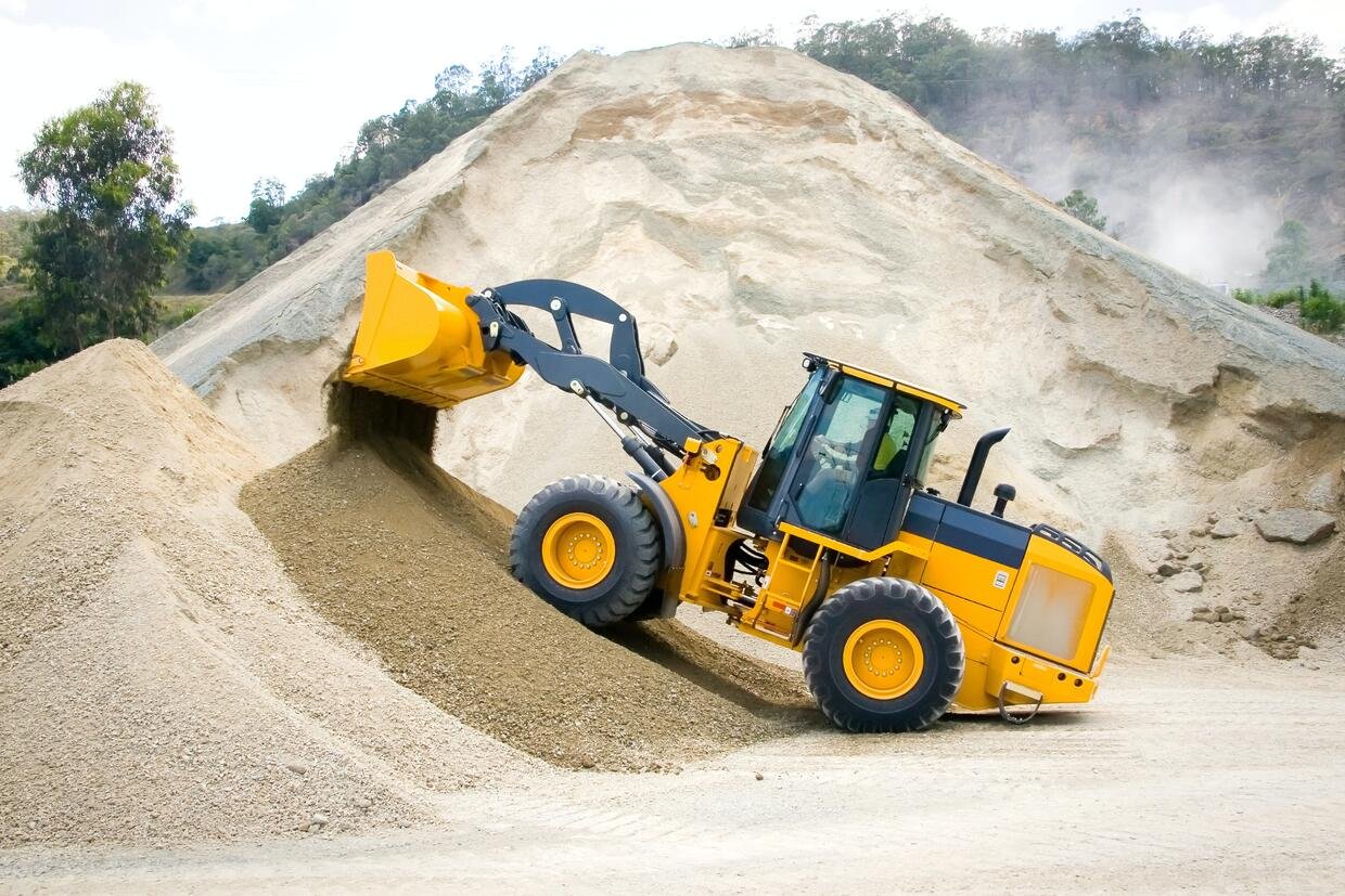 Wheel loader dumping crushed gravel for a driveway base