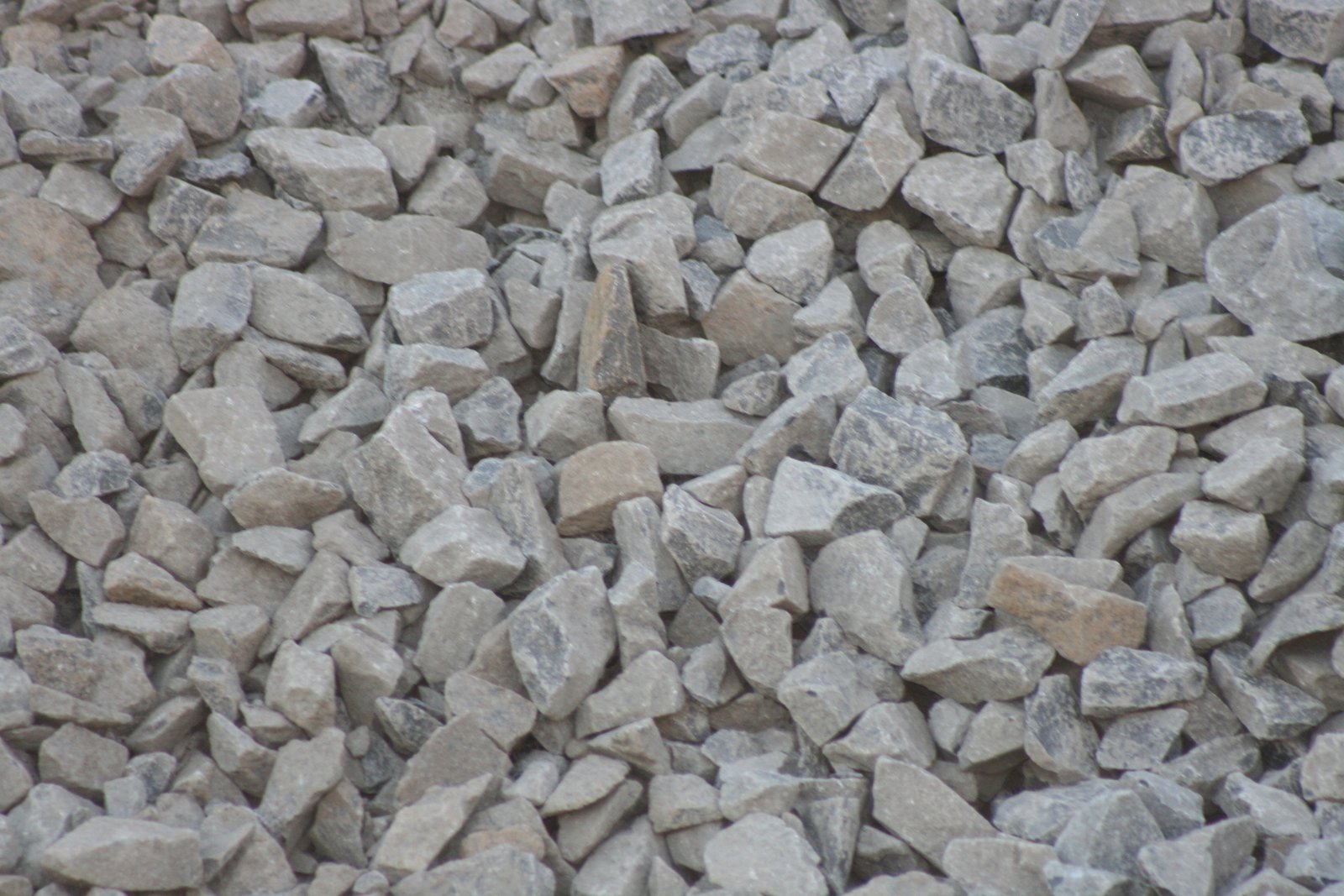 Close-up of gray angular crushed basalt quarry spalls