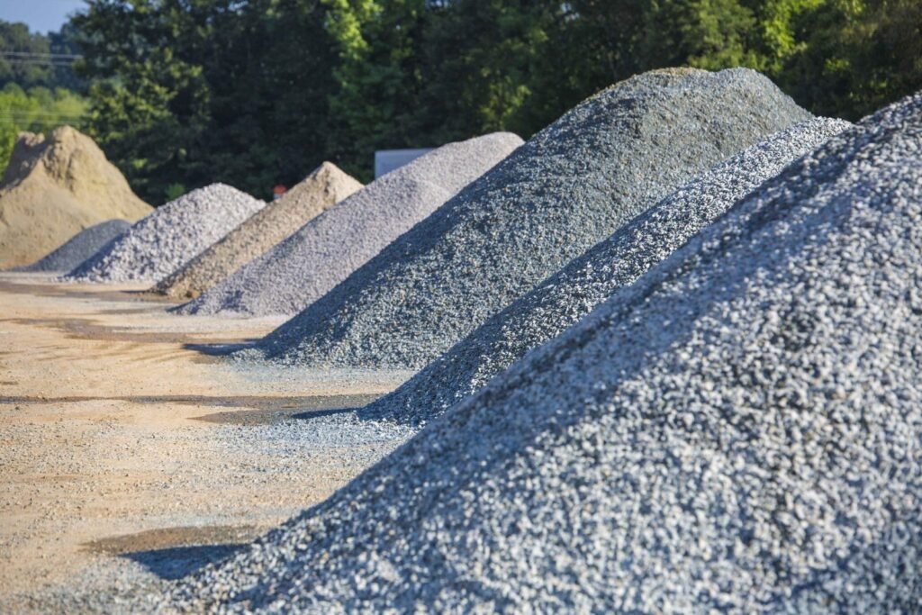 Rows of bulk landscape material stockpiled at the supply yard